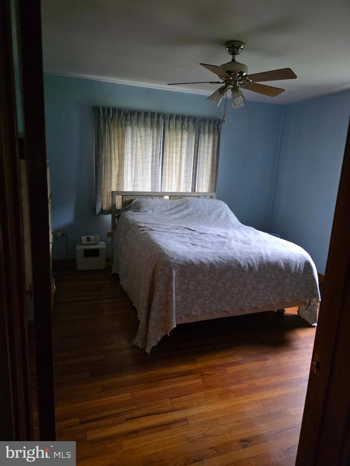 161 Pike Road Howard, PA 16841 - Photo 10 of 15 a bedroom with a bed and a window