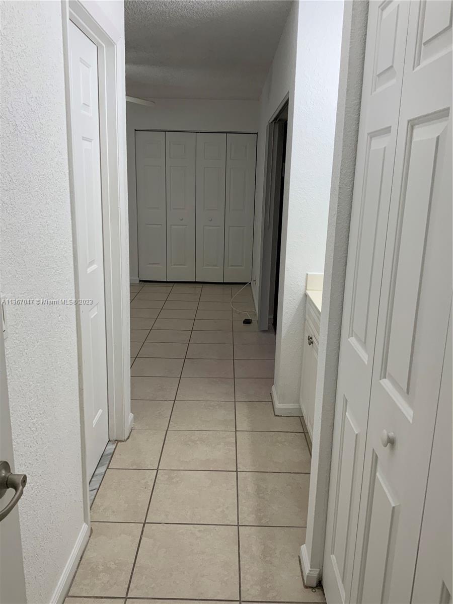 8110 Severn Drive, Unit C Boca Raton, FL 33433 - Photo 12 of 31 a view of a bathroom with a sink