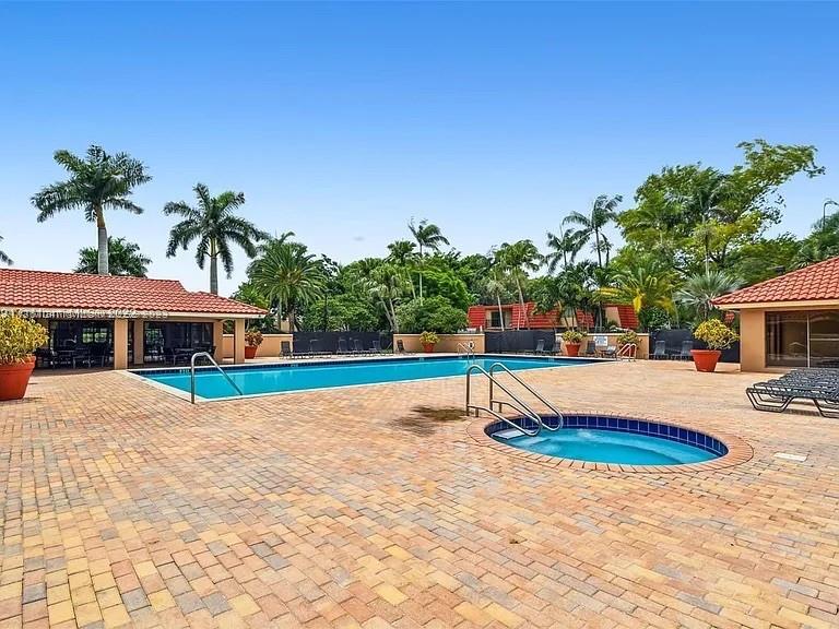 8110 Severn Drive, Unit C Boca Raton, FL 33433 - Photo 29 of 31 a view of a house with entertaining space