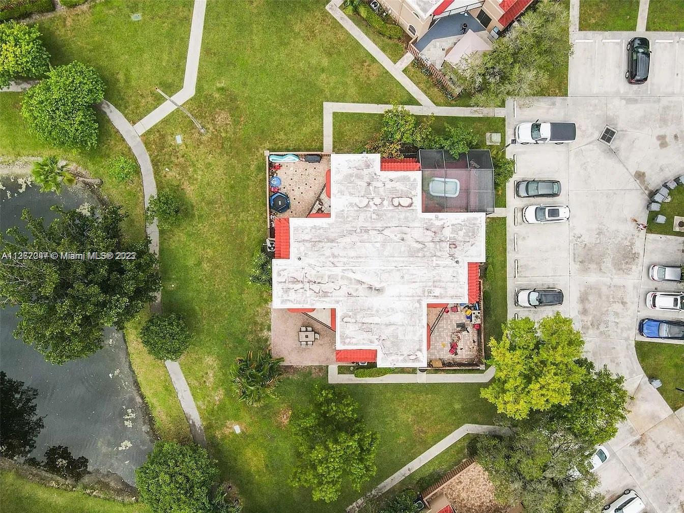 8110 Severn Drive, Unit C Boca Raton, FL 33433 - Photo 31 of 31 an aerial view of residential house with outdoor space and swimming pool
