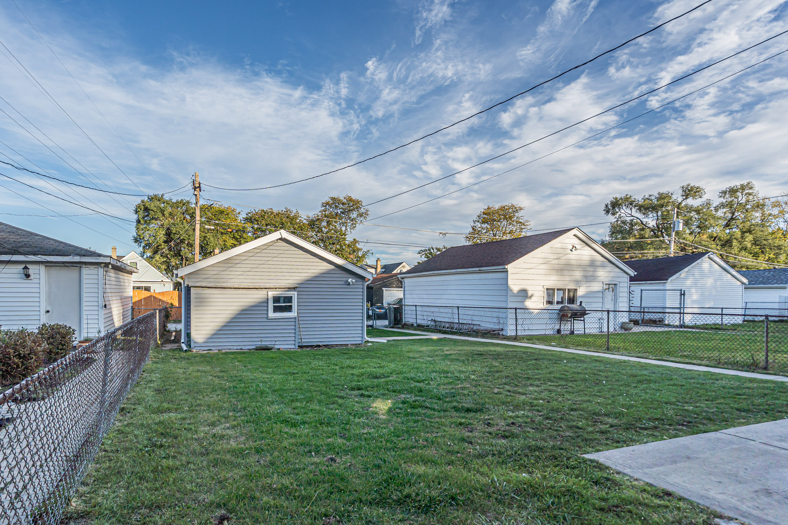 31 46th Avenue Bellwood, IL 60104 - Photo 27 of 30 a front view of house with yard and green space