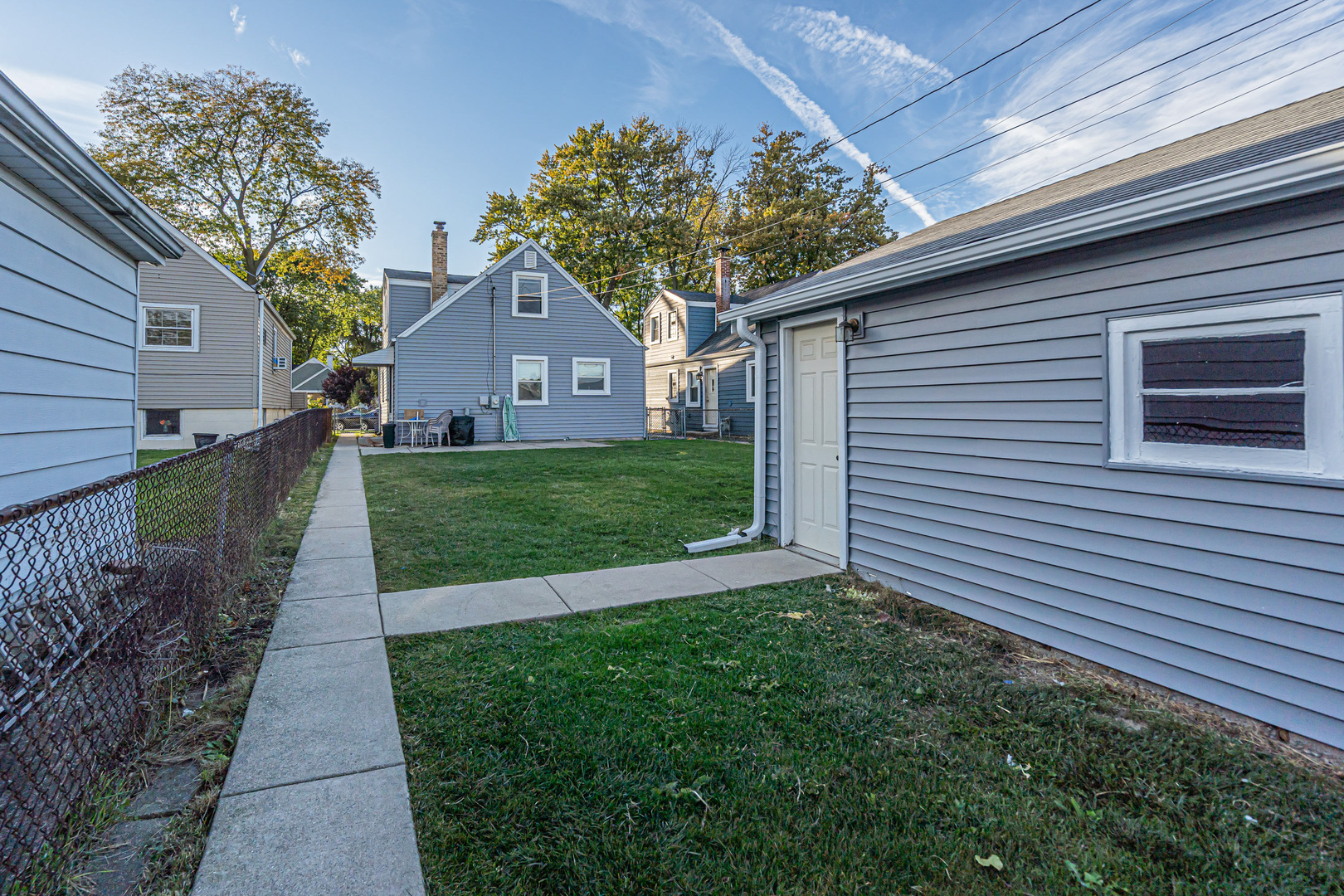 31 46th Avenue Bellwood, IL 60104 - Photo 29 of 30 a front view of a house with a yard