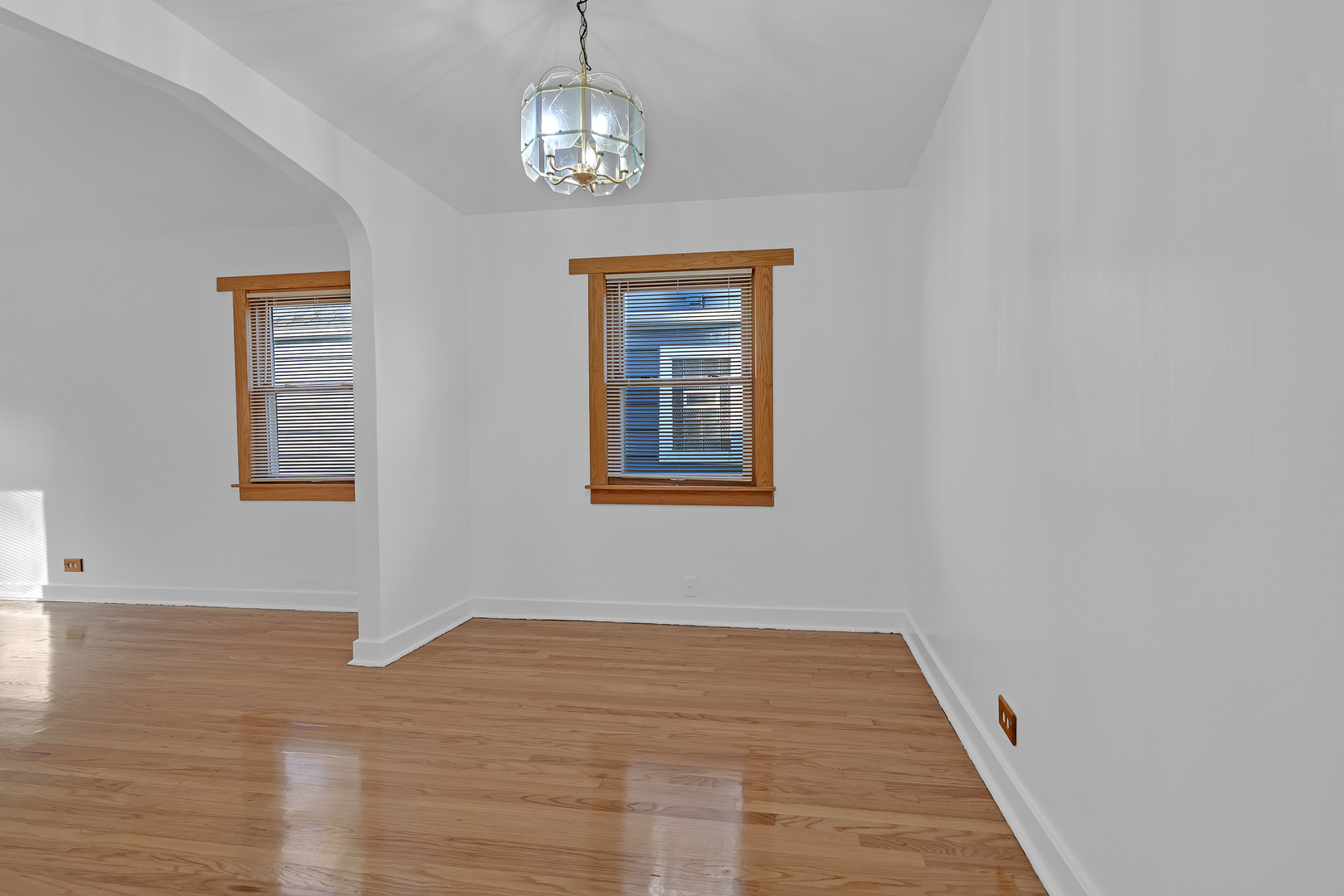 31 46th Avenue Bellwood, IL 60104 - Photo 6 of 30 a view of empty room with wooden floor and window