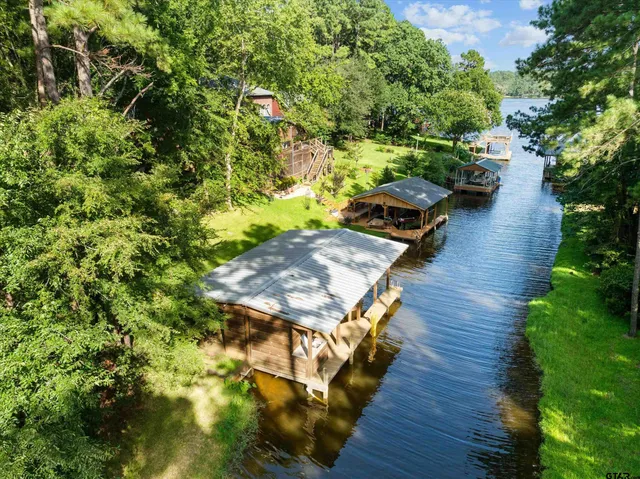 a view of a yard with an outdoor seating