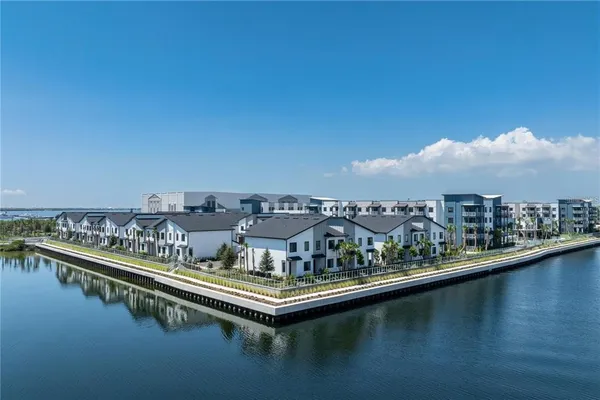 a view of a city with tall buildings in ocean