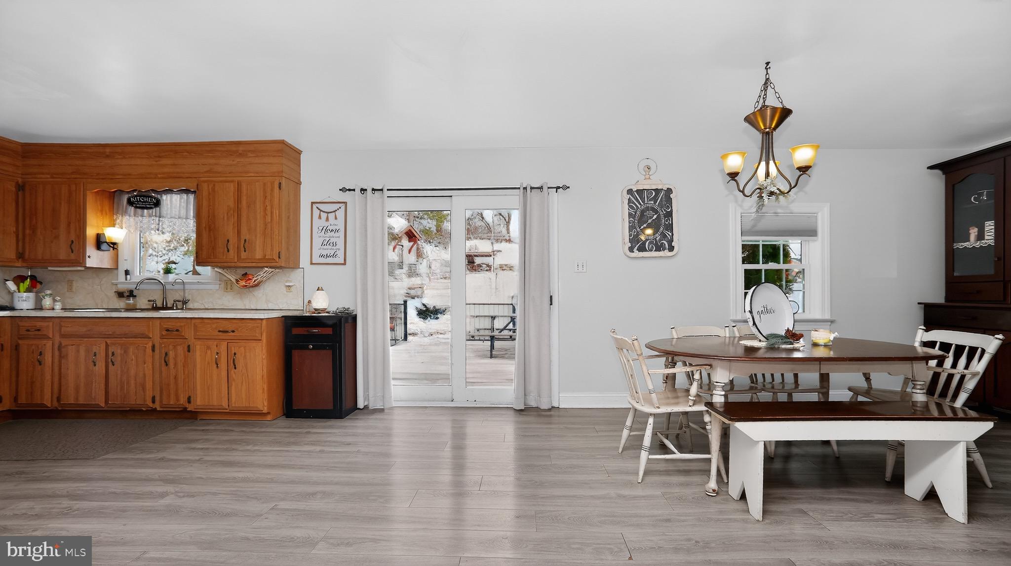 513 Jacobs Road Narvon, PA 17555 - Photo 11 of 69 a view of a dining room with furniture and wooden floor