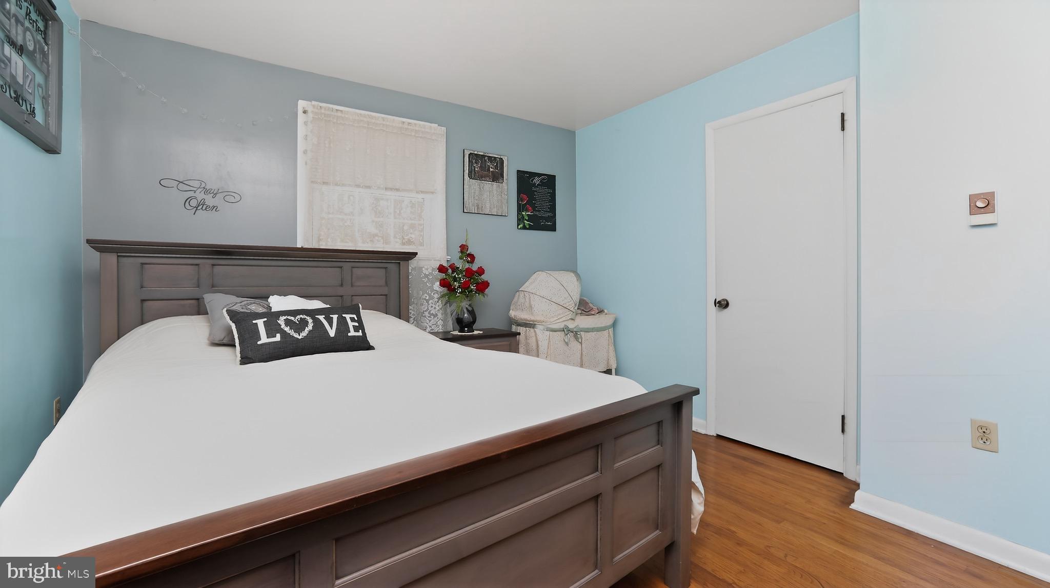 513 Jacobs Road Narvon, PA 17555 - Photo 18 of 69 a room with a bed and wooden floor