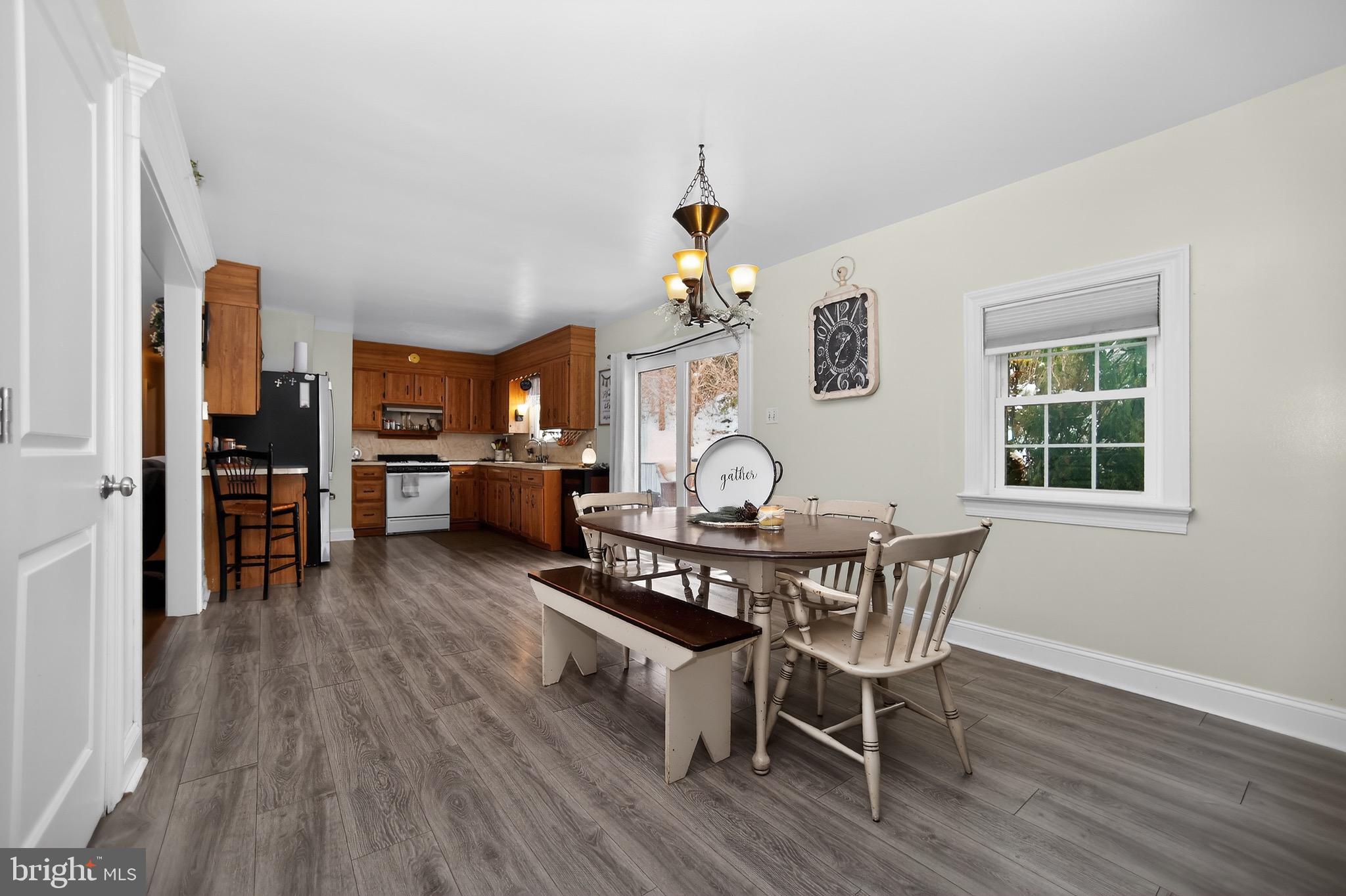 513 Jacobs Road Narvon, PA 17555 - Photo 2 of 69 a view of a dining room with furniture and wooden floor