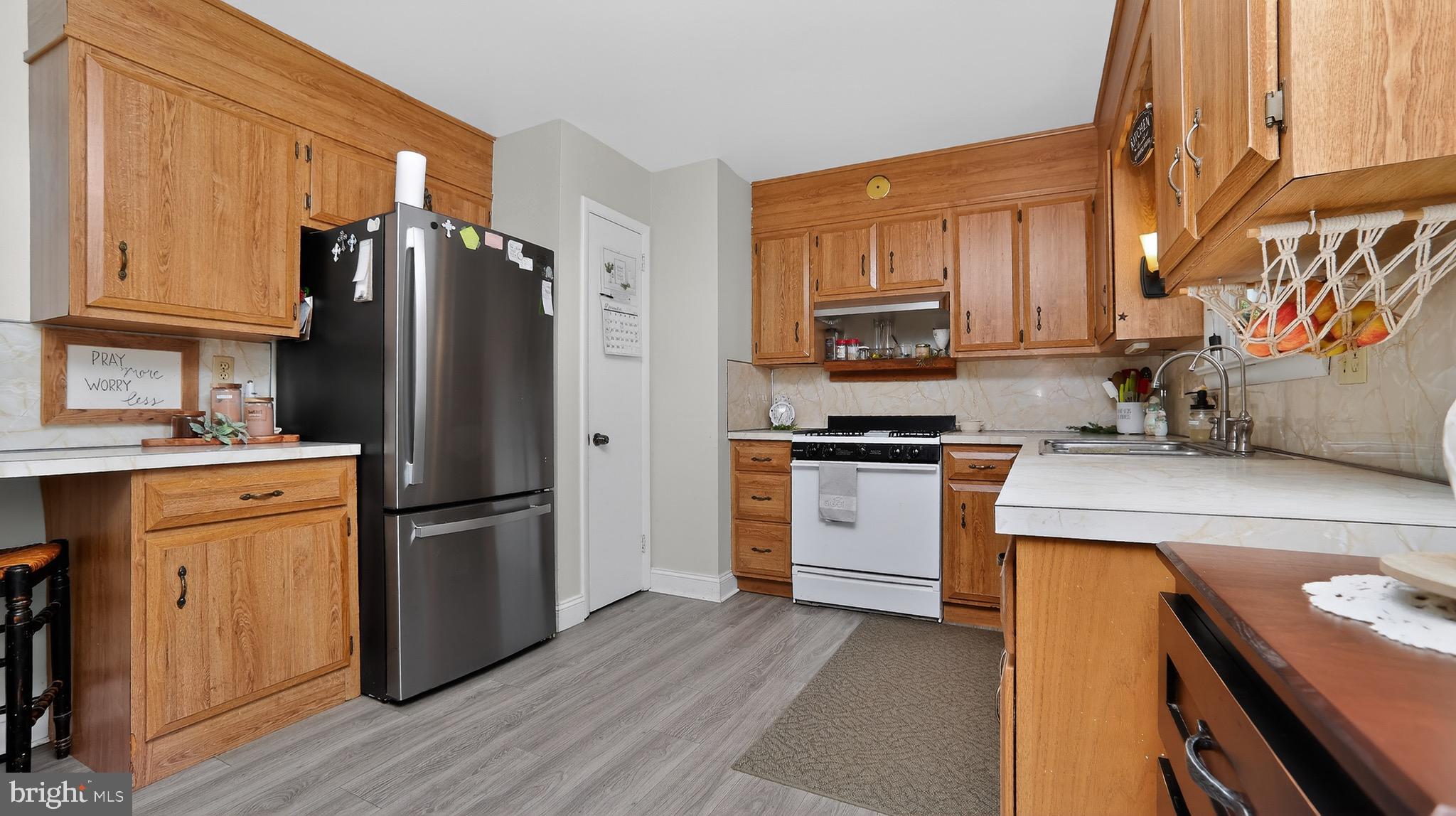 513 Jacobs Road Narvon, PA 17555 - Photo 3 of 69 a kitchen with stainless steel appliances a refrigerator stove and sink