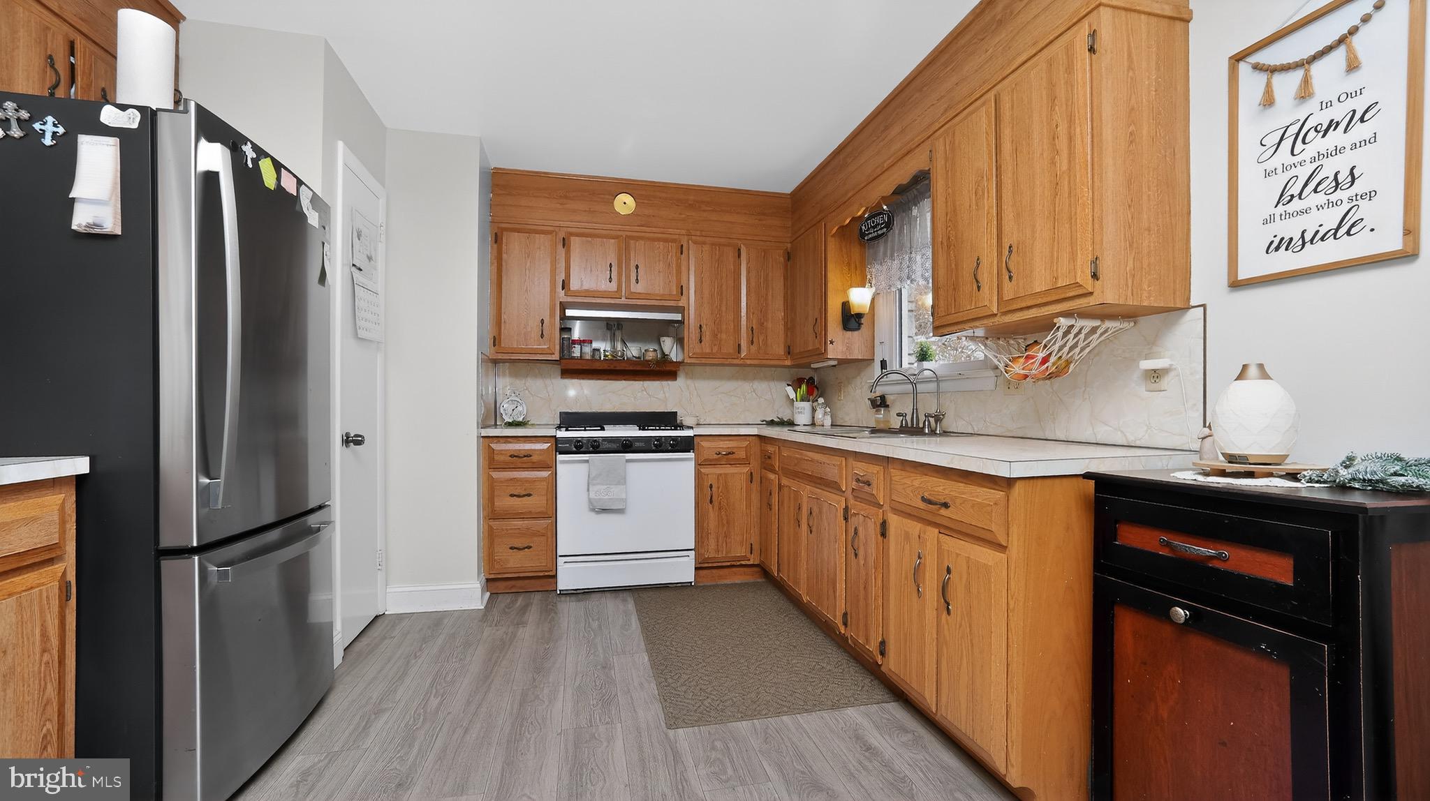 513 Jacobs Road Narvon, PA 17555 - Photo 4 of 69 a kitchen with stainless steel appliances a refrigerator sink and cabinets