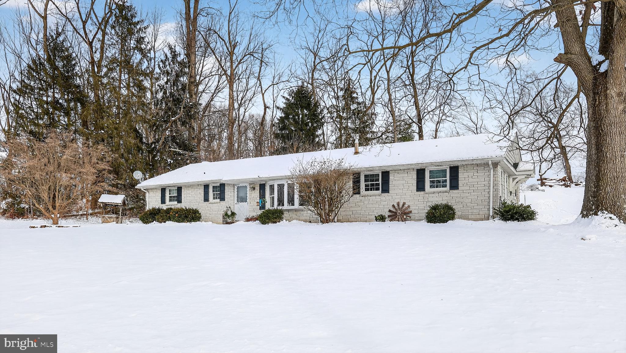 513 Jacobs Road Narvon, PA 17555 - Photo 42 of 69 a view of a house with a yard covered in snow
