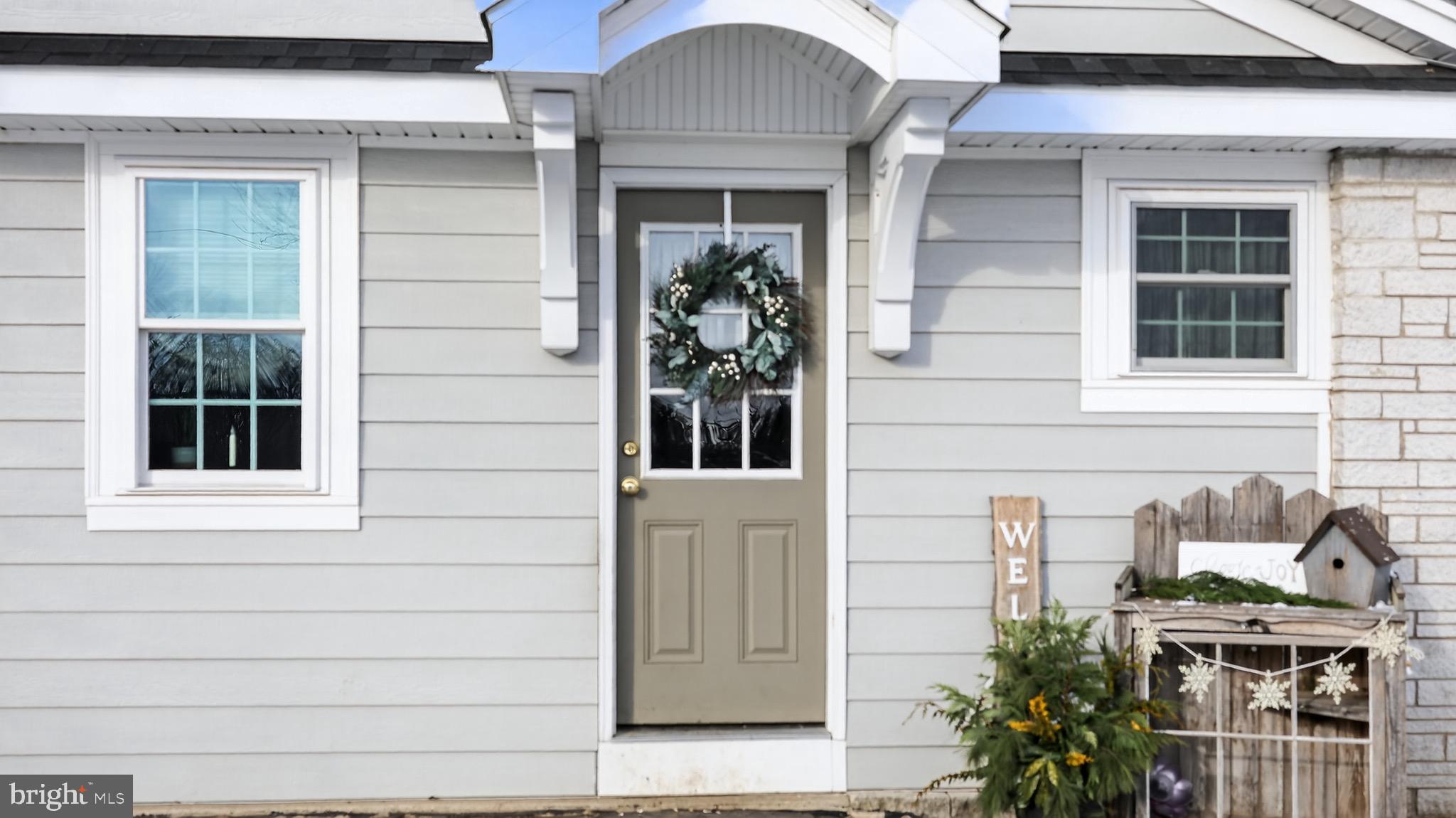 513 Jacobs Road Narvon, PA 17555 - Photo 43 of 69 a front view of a house with red door