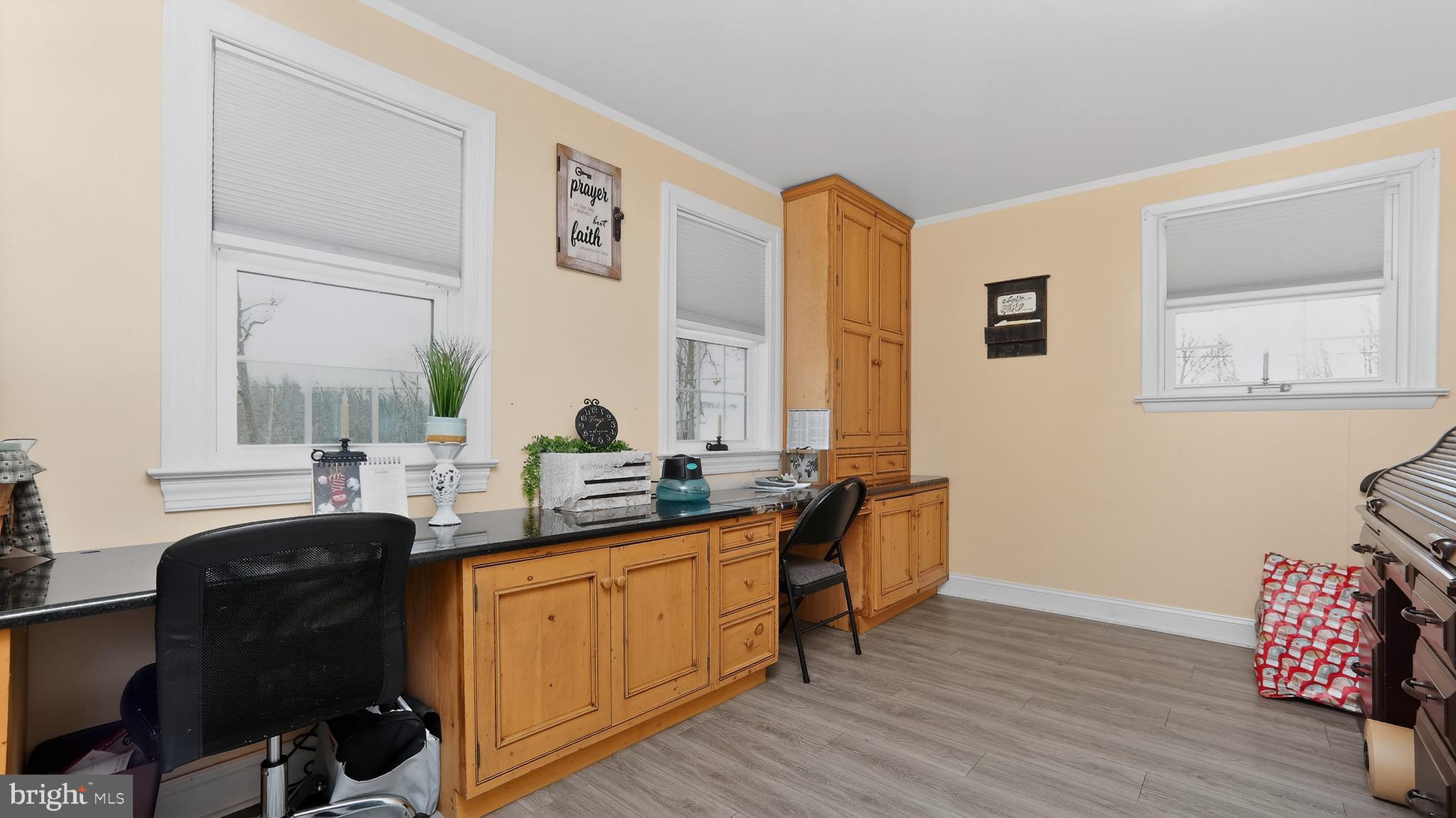 513 Jacobs Road Narvon, PA 17555 - Photo 8 of 69 a kitchen with granite countertop a sink cabinets and wooden floor