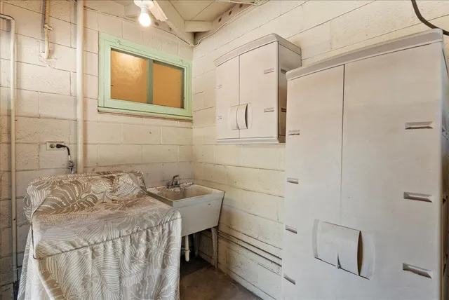 a bathroom with a sink and a shower