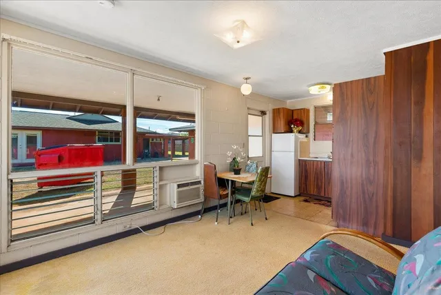 a room with furniture and a window