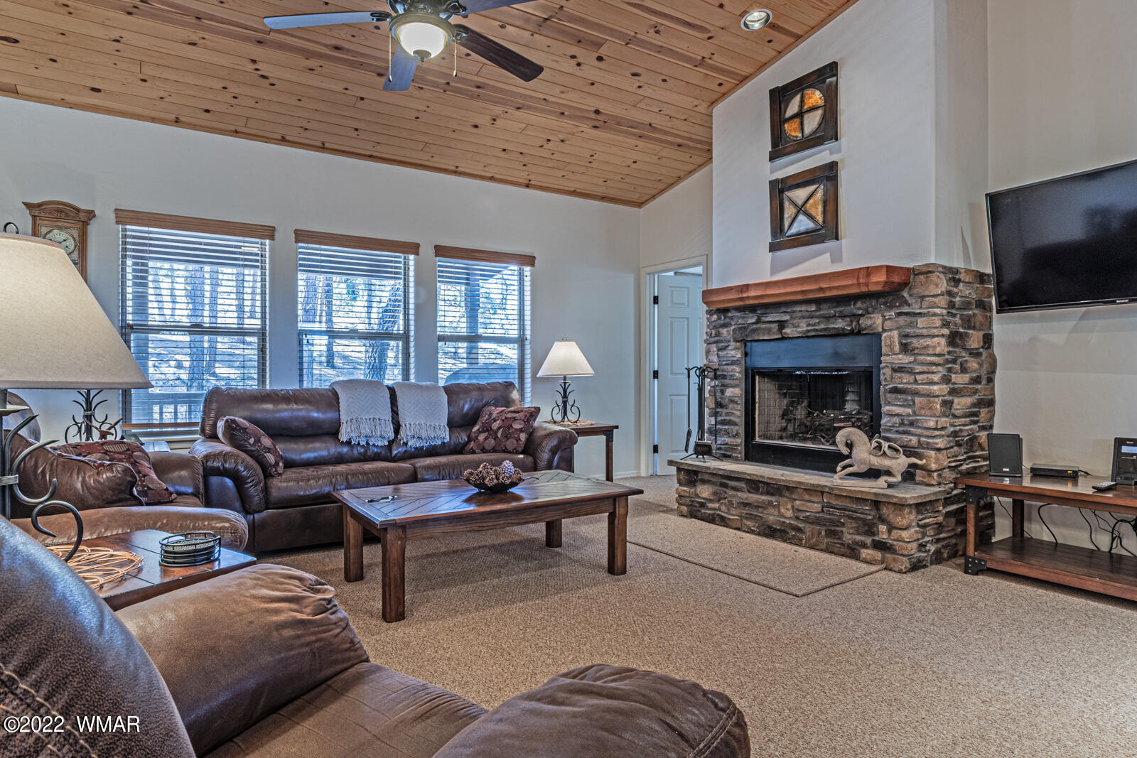 931 Cedar Ridge Run Show Low, AZ 85901 - Photo 11 of 20 a living room with furniture and a fireplace