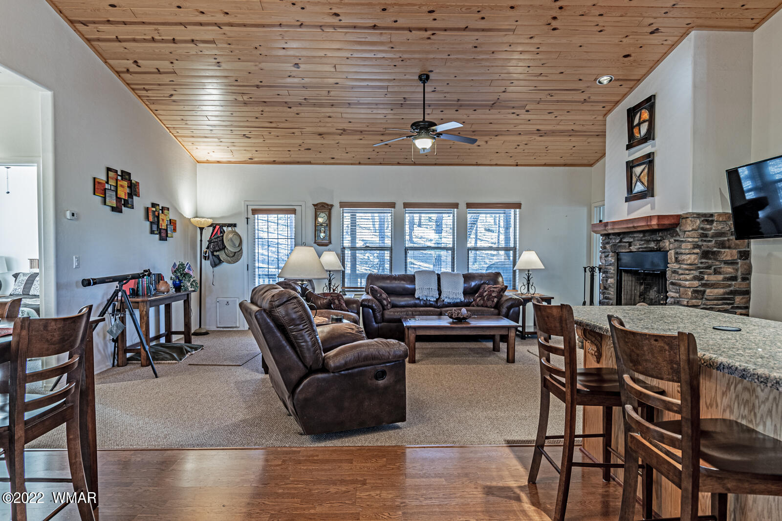 931 Cedar Ridge Run Show Low, AZ 85901 - Photo 4 of 20 a living room with furniture wooden floor and chandelier