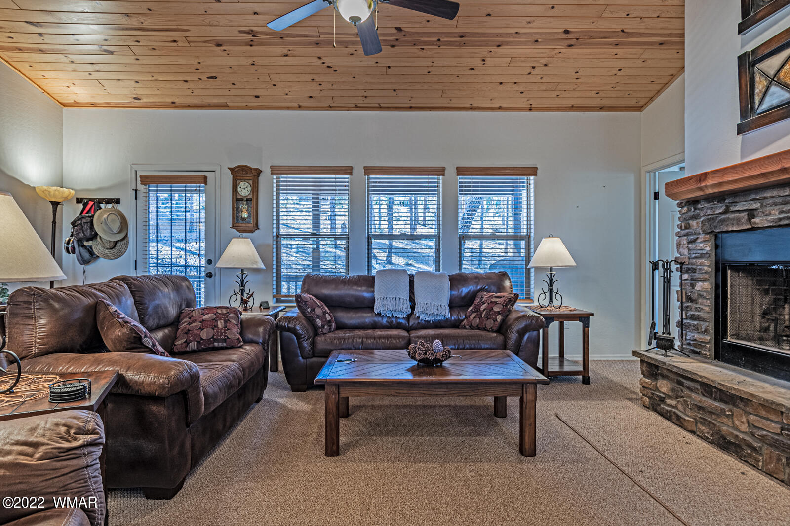 931 Cedar Ridge Run Show Low, AZ 85901 - Photo 10 of 20 a living room with furniture and a fireplace