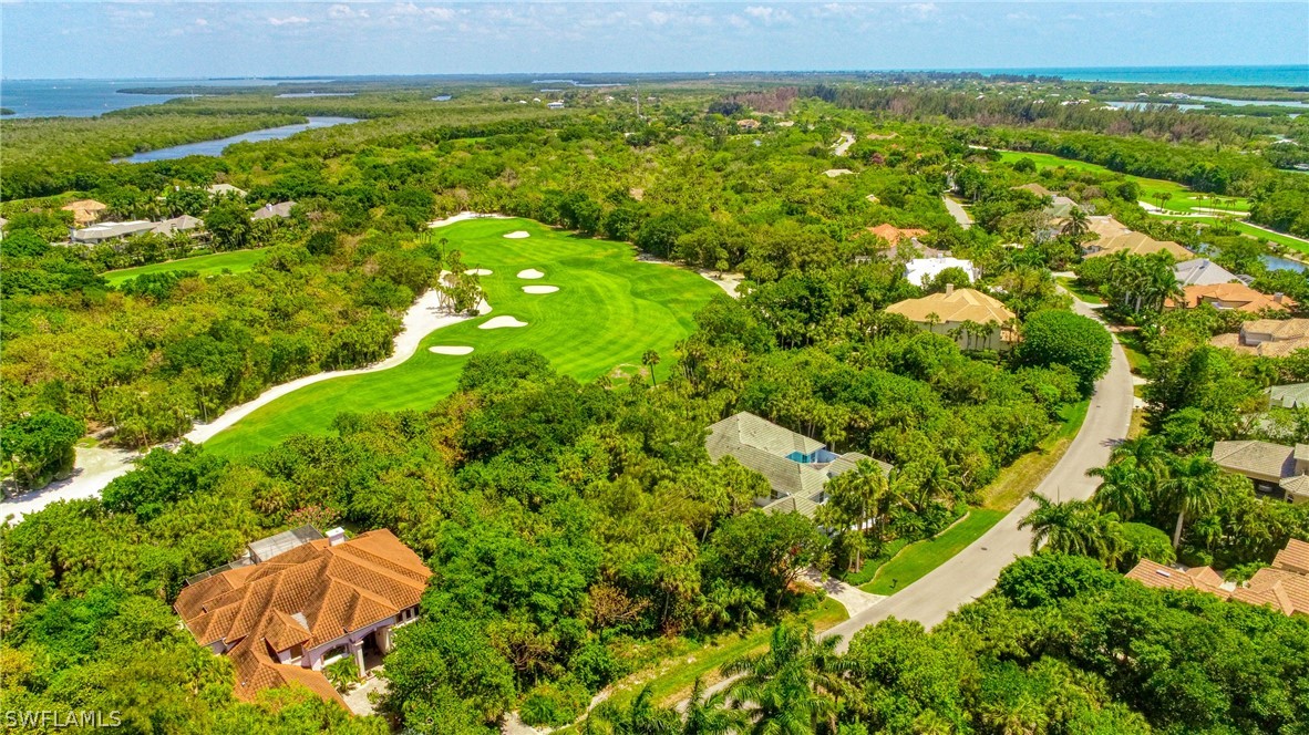 2462 Wulfert Road Sanibel, FL 33957 - Photo 2 of 14 a view of an outdoor space and a lake view