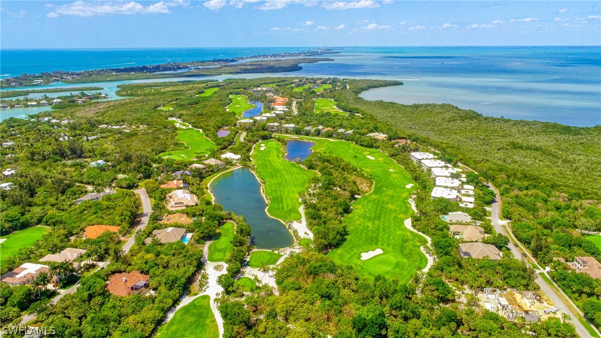 2462 Wulfert Road Sanibel, FL 33957 - Photo 7 of 14 a view of an outdoor space and a lake view