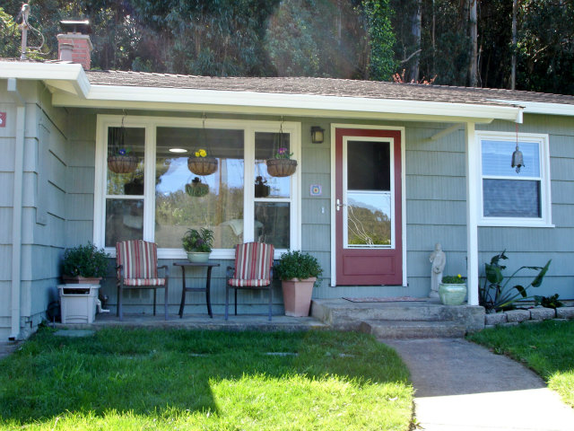 a view of a chairs in front of house