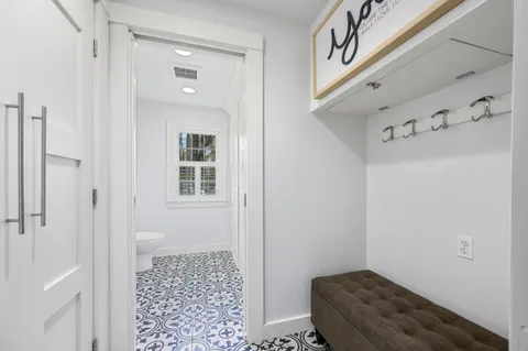 a bedroom with a bed and a couch
