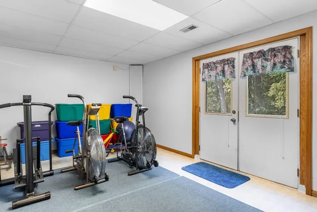 a view of room with gym equipment