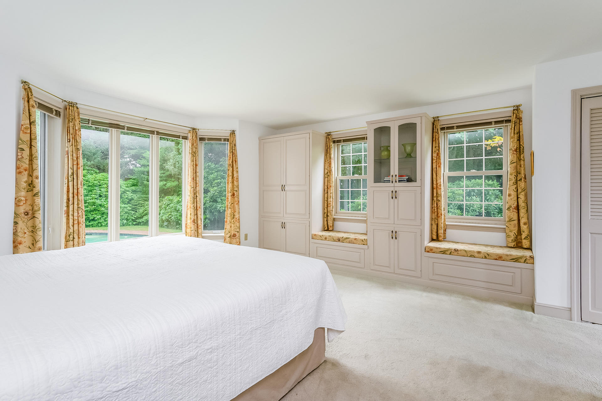 160 Point Hill Road West Barnstable, MA 02668 - Photo 18 of 39 a spacious bedroom with a large bed and a large window