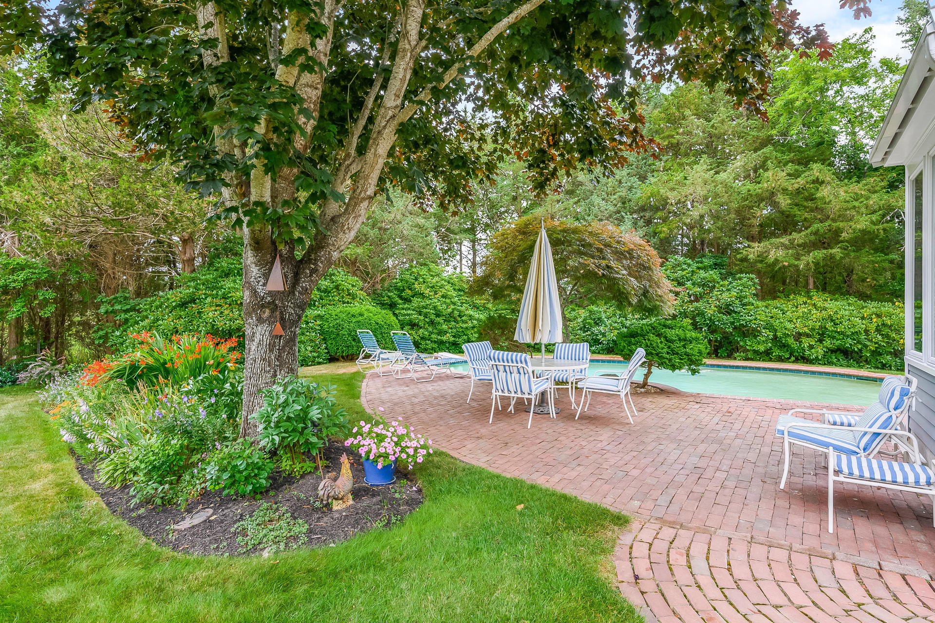 160 Point Hill Road West Barnstable, MA 02668 - Photo 25 of 39 a view of backyard with green space and seating area