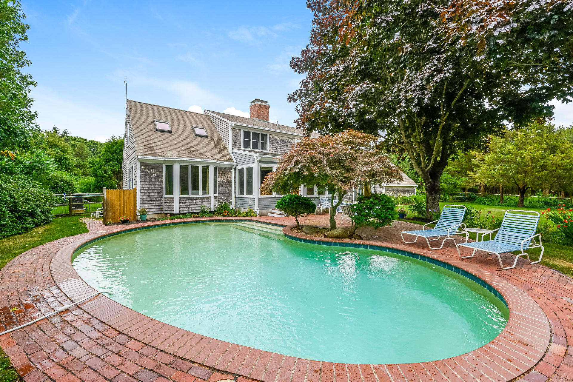 160 Point Hill Road West Barnstable, MA 02668 - Photo 26 of 39 a view of a swimming pool with lounge chair