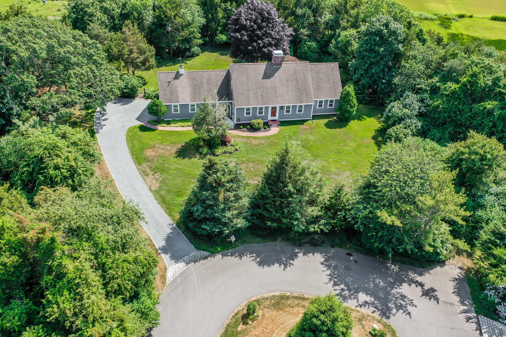 160 Point Hill Road West Barnstable, MA 02668 - Photo 3 of 39 an aerial view of a house with swimming pool and garden