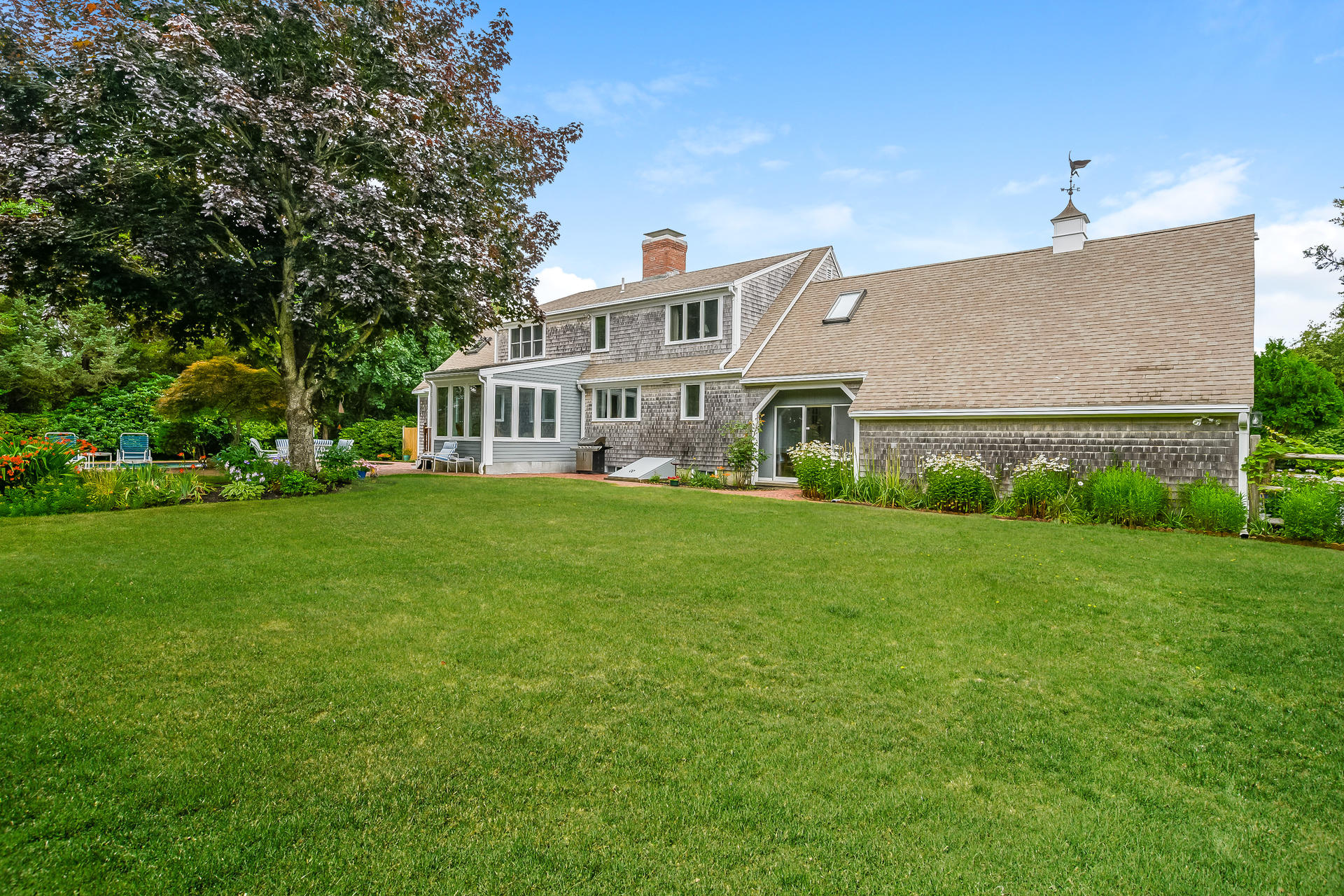 160 Point Hill Road West Barnstable, MA 02668 - Photo 29 of 39 a front view of a house with garden