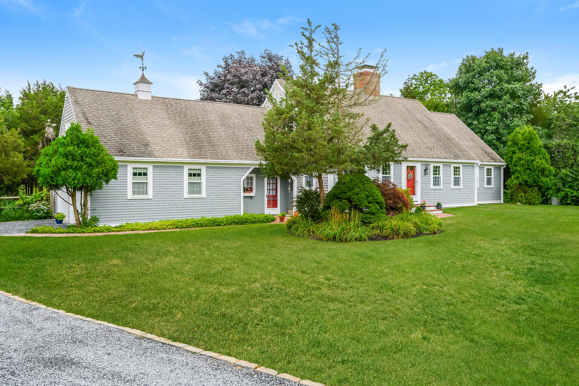 160 Point Hill Road West Barnstable, MA 02668 - Photo 4 of 39 a front view of a house with a yard