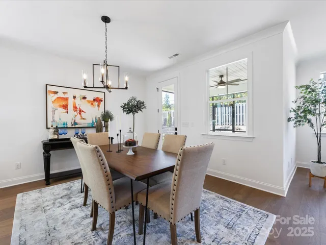 a bedroom with a bed couch and window