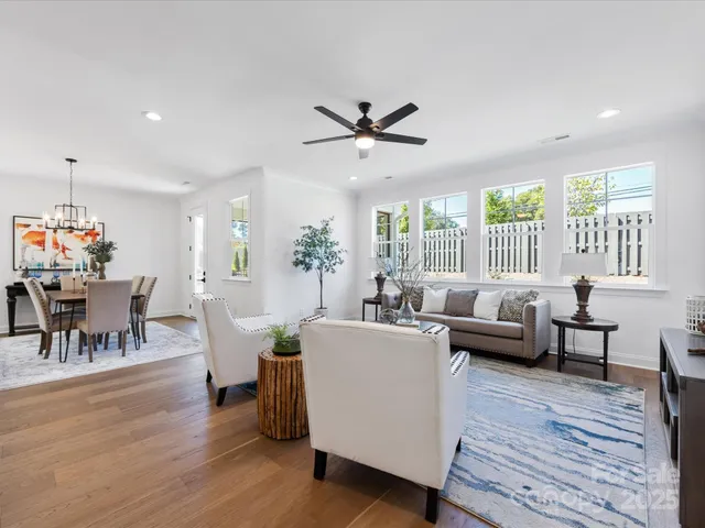 a spacious bedroom with a bed and a window