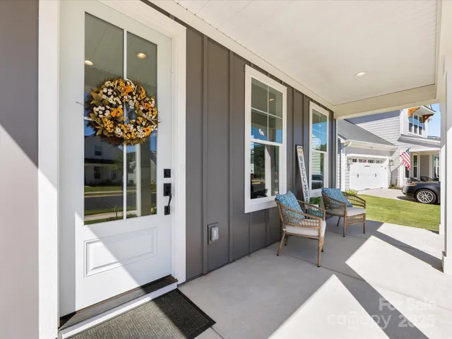 a view of a living room and dining room