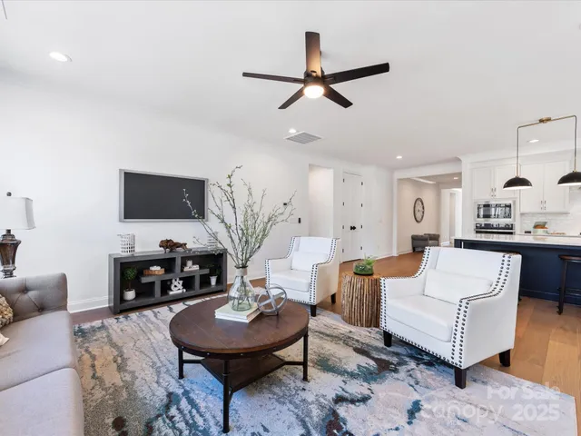 a room with a sink and a granite counter tops