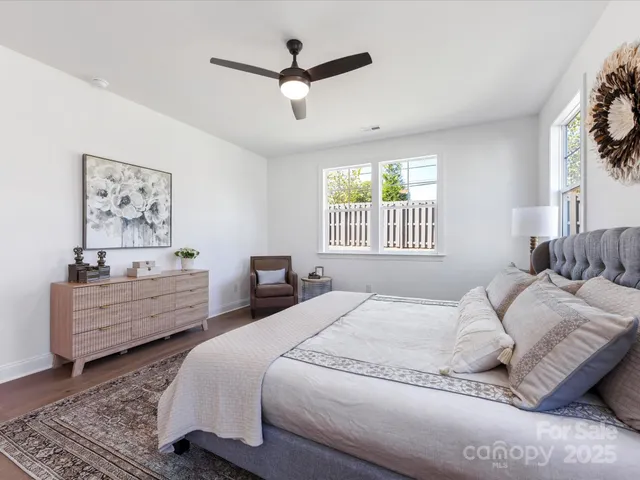 a view of a bench in the backyard of a building