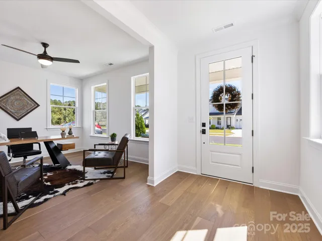 a view of a workspace and dining room
