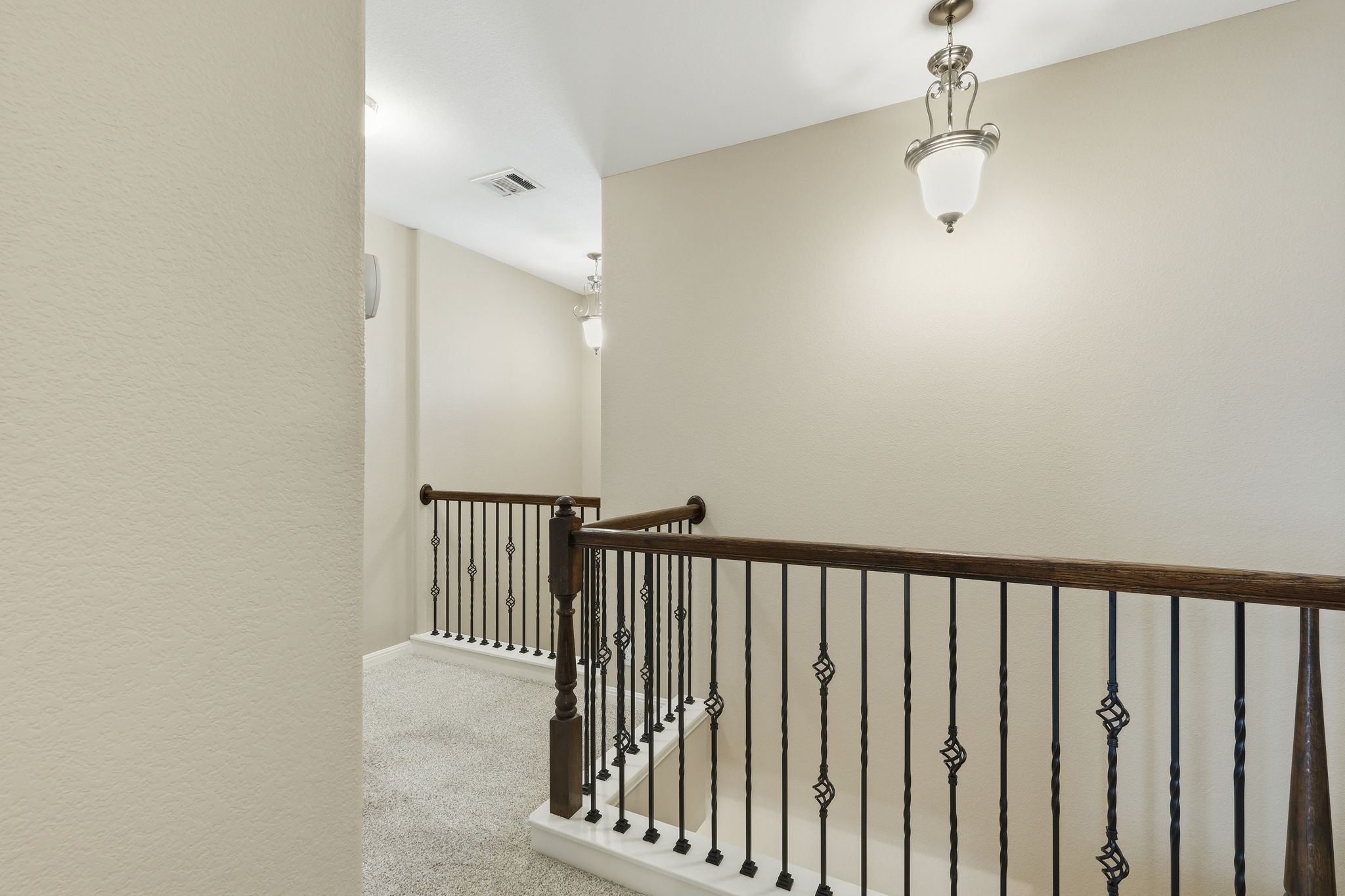 14001 Avery Ranch Boulevard, Unit 602 Austin, TX 78717 - Photo 11 of 39 Hall with light carpet and a textured wall