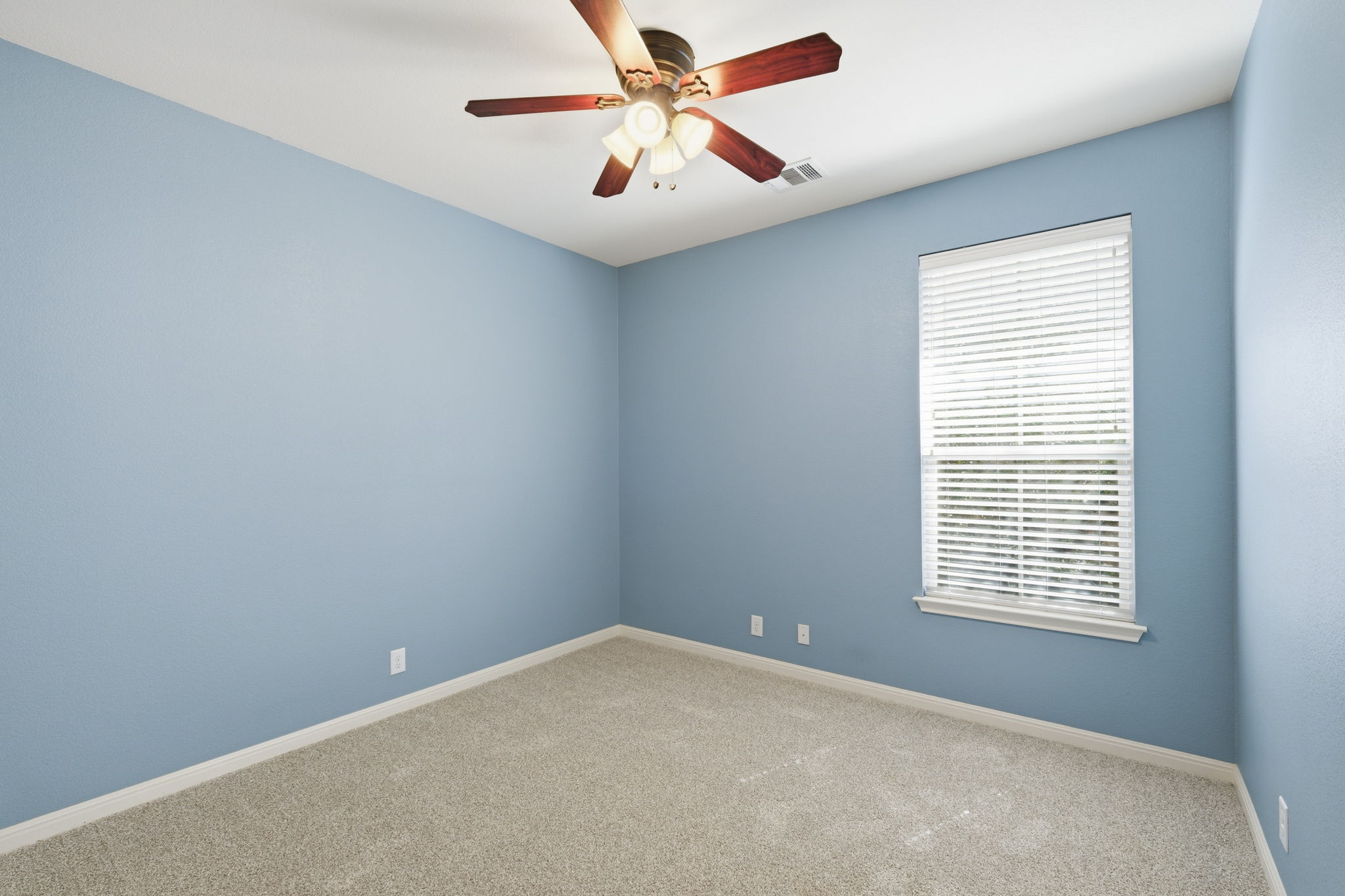 14001 Avery Ranch Boulevard, Unit 602 Austin, TX 78717 - Photo 19 of 39 spare room featuring a ceiling fan and baseboards