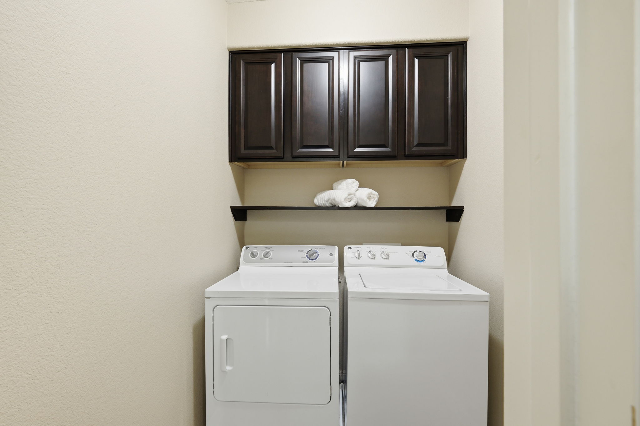 14001 Avery Ranch Boulevard, Unit 602 Austin, TX 78717 - Photo 22 of 39 Laundry room featuring cabinet space and washer and dryer