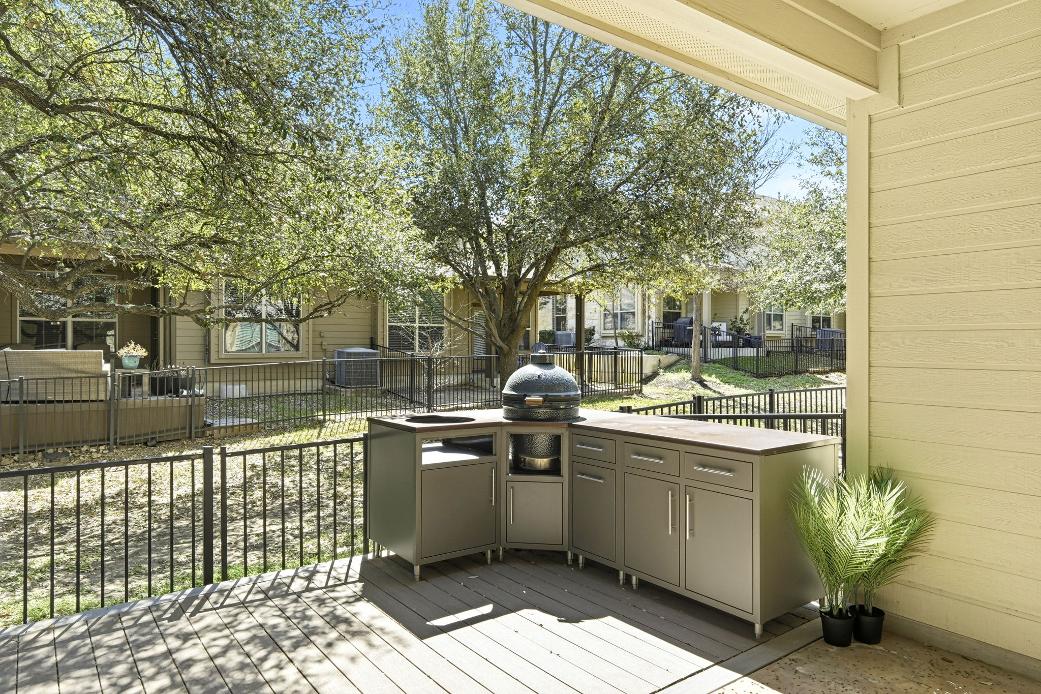 14001 Avery Ranch Boulevard, Unit 602 Austin, TX 78717 - Photo 24 of 39 Deck featuring area for grilling and a residential view