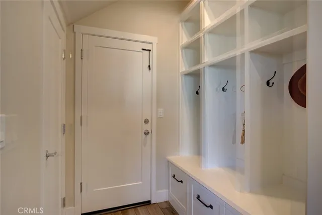 a bathroom with a shower and a sink