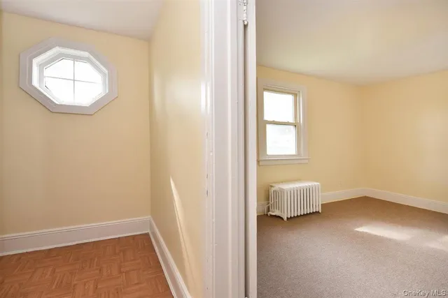a bathroom with a toilet sink and shower
