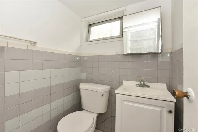 a view of storage and utility room with washer and dryer