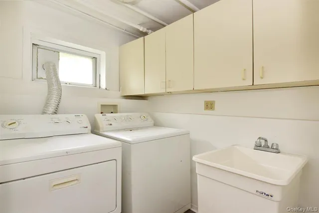 an aerial view of a house with outdoor space and street view