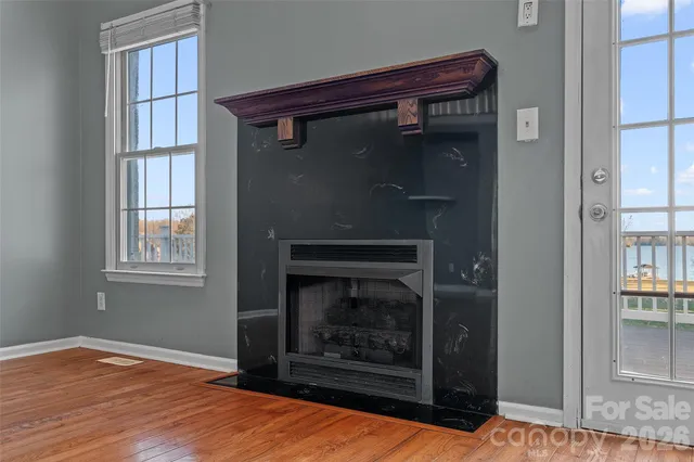 a living room with a fireplace in it