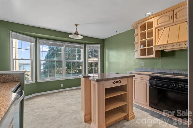 a kitchen with a stove and a sink