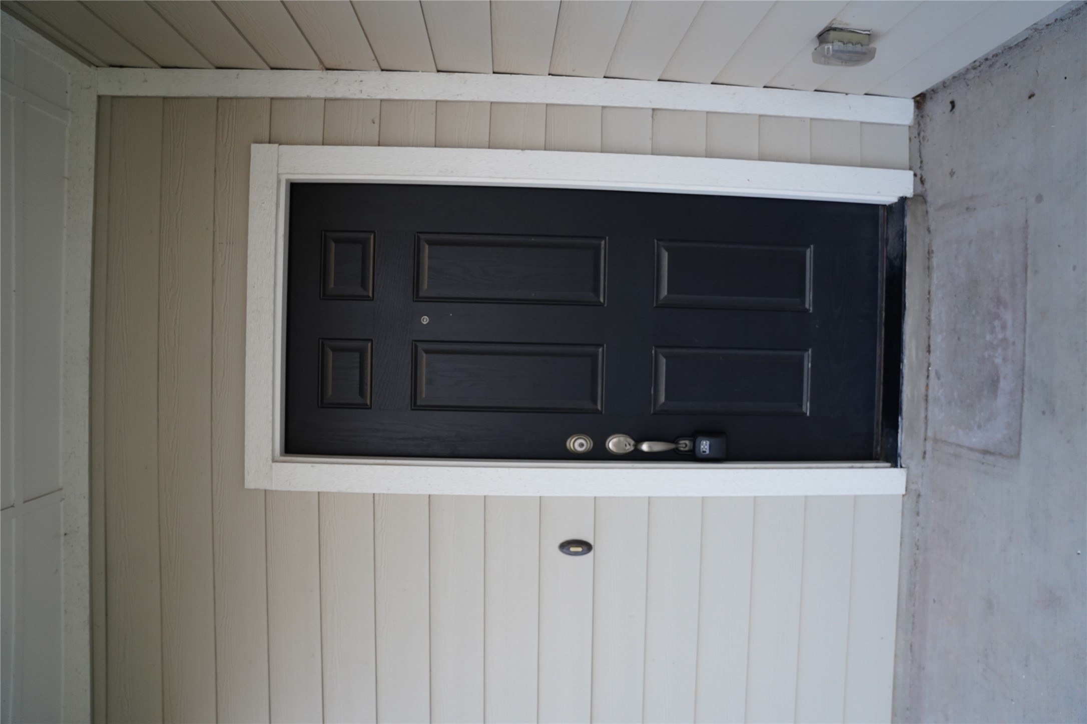 117 Crescent Street Georgetown, TX 78626 - Photo 27 of 38 A classic paneled entry door offers a welcoming invitation to this charming residence.